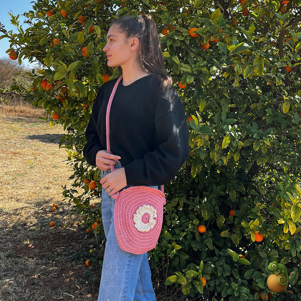 Pink Crocheted Handbag with Crossbody Strap & White Flower - ChameleonCrotchet