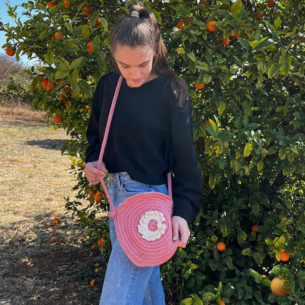 Pink Crocheted Handbag with Crossbody Strap & White Flower - ChameleonCrotchet